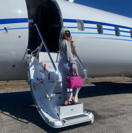 Skyy flying in private jet 24/7 JetImage Source: Instagram alexisskyy_